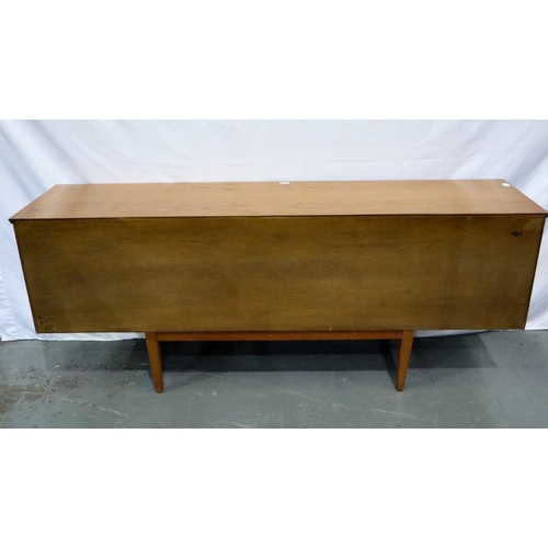 2162 - Long teak asymmetric sideboard with two end cupboards, drop down cupboard and four drawers, 183 x 45... 