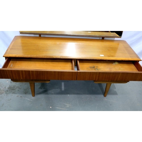 2164 - 1970s teak dressing table with two long over two shelf drawers on tapering supports, 140 x 45 cm. No... 