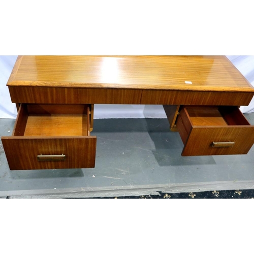 2164 - 1970s teak dressing table with two long over two shelf drawers on tapering supports, 140 x 45 cm. No... 