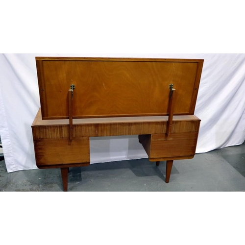 2164 - 1970s teak dressing table with two long over two shelf drawers on tapering supports, 140 x 45 cm. No... 