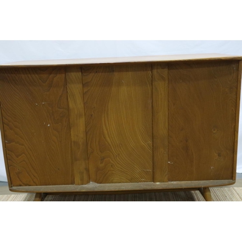 2170 - Ercol asymmetric elm three cupboard single drawer sideboard, 110 x 40 x 82 cm H, minor scratches to ... 