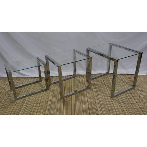 2173 - Mid 20th century set of three graduated nesting tables with polished steel framed and glass tops, la... 