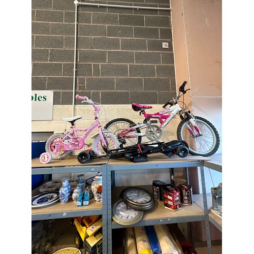 1005A - Two girls bikes and a folding pram. Not available for in-house P&P