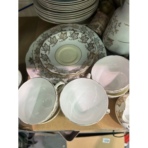 1045 - Quantity of mixed ceramics including a boxed Wedgwood tankard and tea/dinner service. Not available ... 