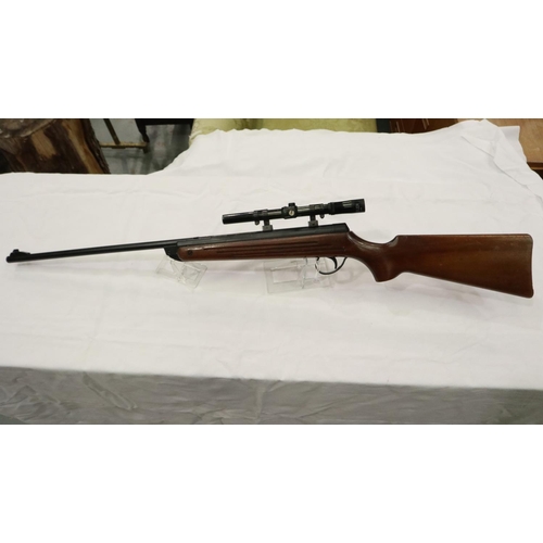2102 - BSA Meteor .22 air rifle with scope, optic clouded, action is smooth although there is heavy dieseli... 