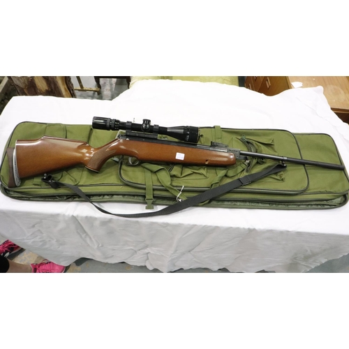 2107 - Webley Omega .22 calibre air rifle, adjustable butt pad, 4 x 12 scope, one piece mount, optic is cle... 