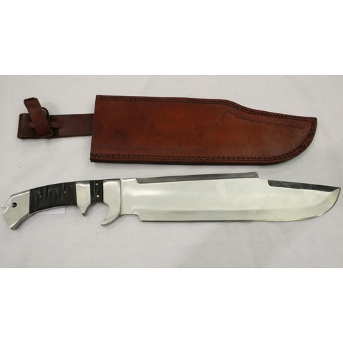 2131 - A contemporary Bowie style knife with leather sheath. P&P Group 2 (£18+VAT for the first lot and £3+... 