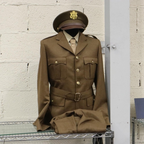 2174 - American post-war military dress uniform, comprising tunic, trousers, visor cap, shirt and tie, some... 