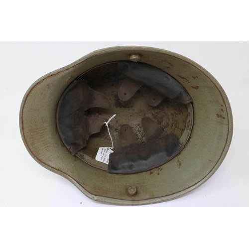 2185 - WWI German model 1917 Stahlhelm helmet with original green paint. P&P Group 2 (£18+VAT for the first... 
