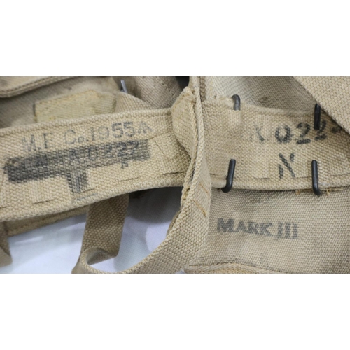 2222 - Webbing: British 1944 and 1955 dated pattern khaki webbing pouches and straps. P&P Group 1 (£14+VAT ... 