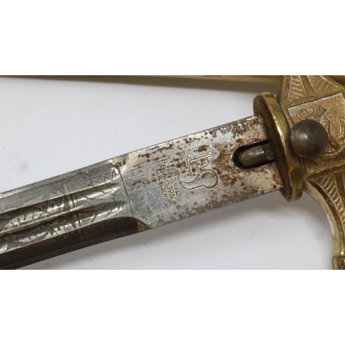 2240 - Kriegsmarine presentation dagger with polished gilt brass scabbard, the blade marked Original Eickho... 