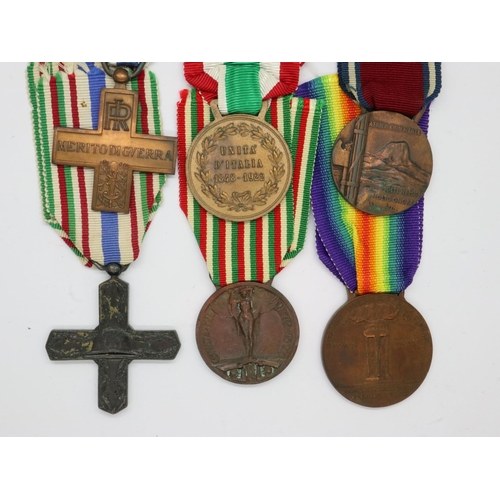 2400 - Six Italian and later medals and awards, including Vittorio Veneto cross, Italian Unification medal,... 