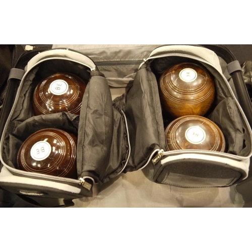 2160A - Polished lignum vitae boules balls with carry cases, initialled B.E. P&P Group 2 (£18+VAT for the fi... 