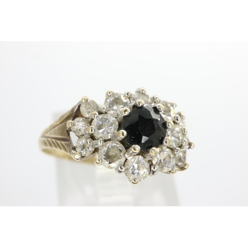 50 - 9ct gold cluster ring set with sapphire and cubic zirconia, size O, 2.4g. P&P Group 1 (£14+VAT for t... 