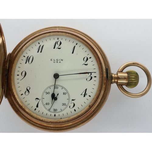 79 - 9ct gold full hunter Elgin pocket watch, working at lotting. P&P Group 1 (£14+VAT for the first lot ... 