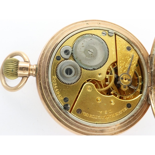 79 - 9ct gold full hunter Elgin pocket watch, working at lotting. P&P Group 1 (£14+VAT for the first lot ... 