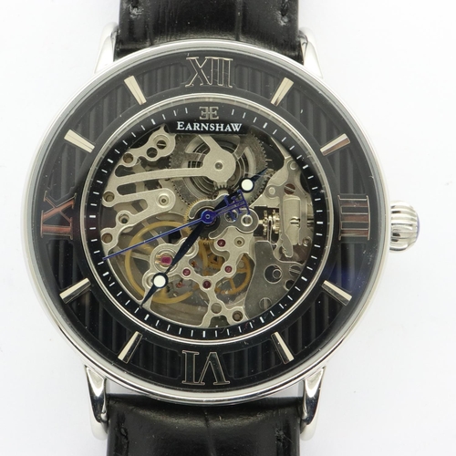 82 - EARNSHAW: gents new old stock wristwatch with skeleton movement, working at lotting. P&P Group 1 (£1... 
