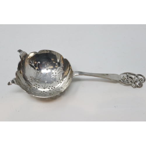 145 - Hallmarked silver tea strainer, 36g. P&P Group 1 (£14+VAT for the first lot and £1+VAT for subsequen... 