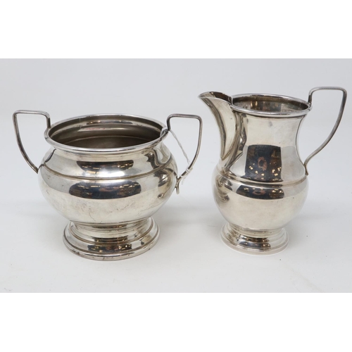 147 - Garrard & Co LTD Regent St, silver on copper sugar bowl with milk jug, largest H: 12 cm. P&P Group 1... 