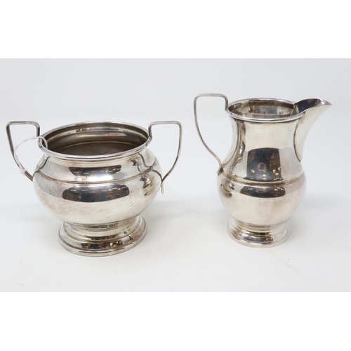 147 - Garrard & Co LTD Regent St, silver on copper sugar bowl with milk jug, largest H: 12 cm. P&P Group 1... 