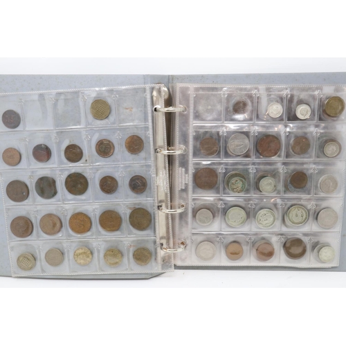 177 - A folder of mixed world coins, including some silver denominations. P&P Group 1 (£14+VAT for the fir... 