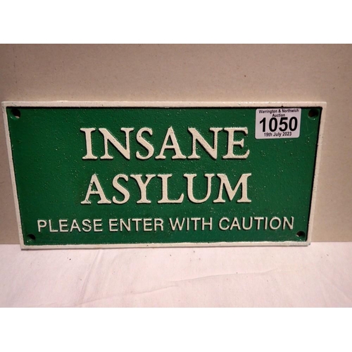 1050 - Cast iron Insane Asylum sign, W: 30 cm. P&P Group 1 (£14+VAT for the first lot and £1+VAT for subseq... 