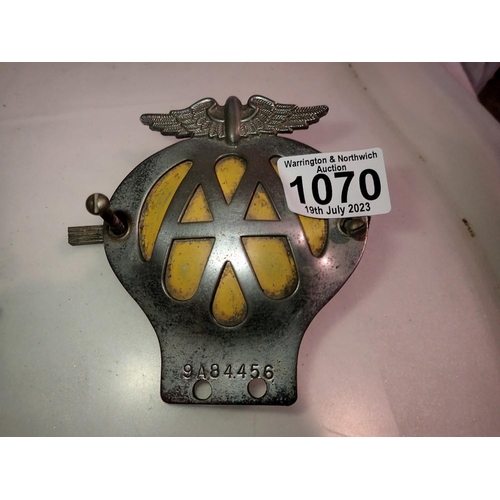 1070 - 1957-1959 AA car badge, serial no 9A84456. P&P Group 1 (£14+VAT for the first lot and £1+VAT for sub... 