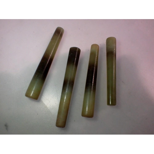 1086 - Four ancient turned jade columns, L: 60 mm. P&P Group 1 (£14+VAT for the first lot and £1+VAT for su... 
