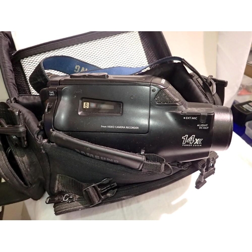 1120 - Samsung VP K60 camcorder with travel bag and instructions. All electrical items in this lot have bee... 