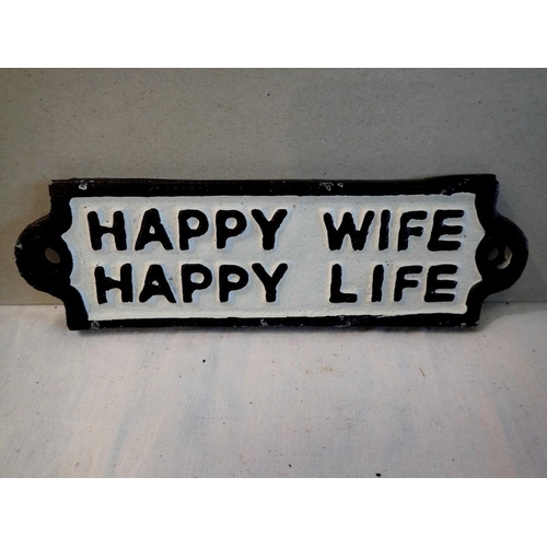 1169 - Cast iron Happy Wife Happy Life plaque, W: 12 cm. P&P Group 1 (£14+VAT for the first lot and £1+VAT ... 