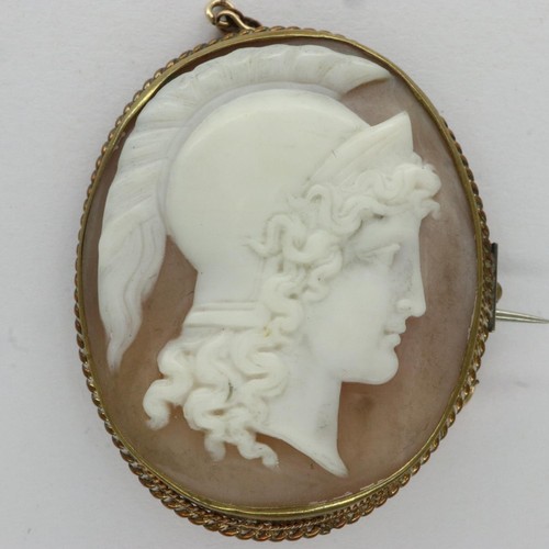 10 - Antique good quality cameo, carved to depict warriors head, mounted in yellow metal with safety chai... 