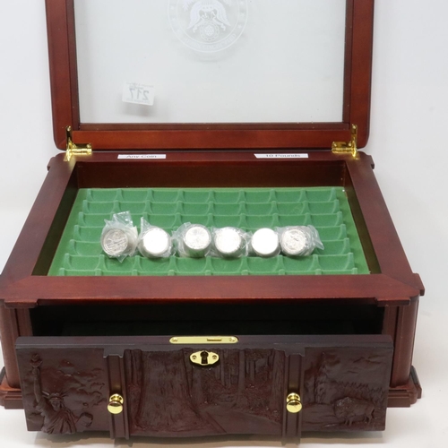217 - Never Circulated U.S State Quarters collectors display case, 33 x 39 x 13 cm H, with six rolls of UN... 