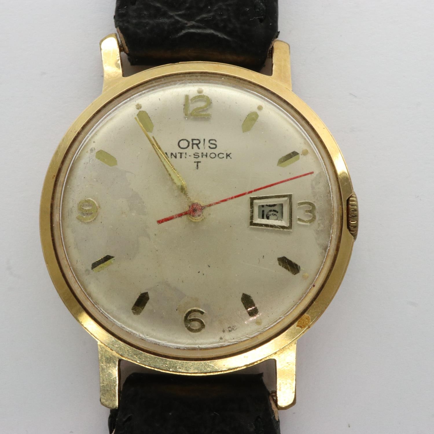 ORIS anti shock T gents wristwatch with date aperture on a black leather strap working at lotting