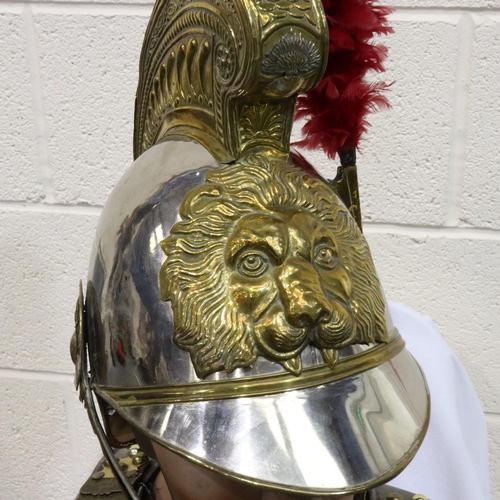 2302 - A Belgian 1842 model cuirassier helmet, with plumes, polished steel shell and pressed brass mounts, ... 