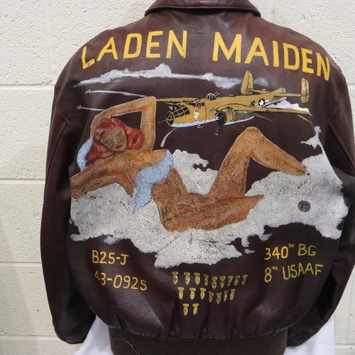 2303 - USAAF WWII style leather flying jacket model A-2, painted with decals and nose-art of Laden Maiden, ... 