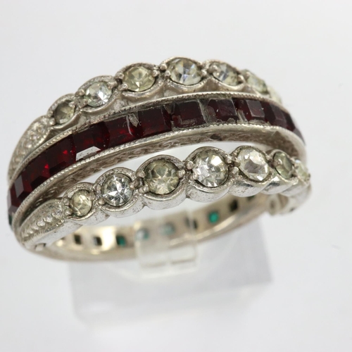 13 - Antique white metal day/night ring set with garnet, emerald and cubic zirconia, missing two emeralds... 