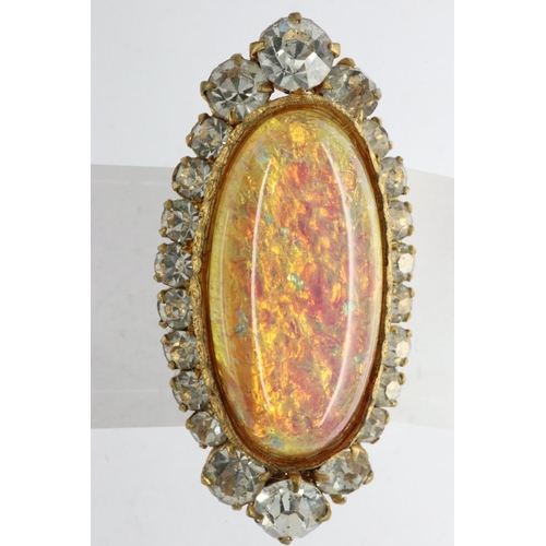 19 - Yellow metal brooch set with large opal and cubic zirconia, L: 40 mm. UK P&P Group 1 (£16+VAT for th... 