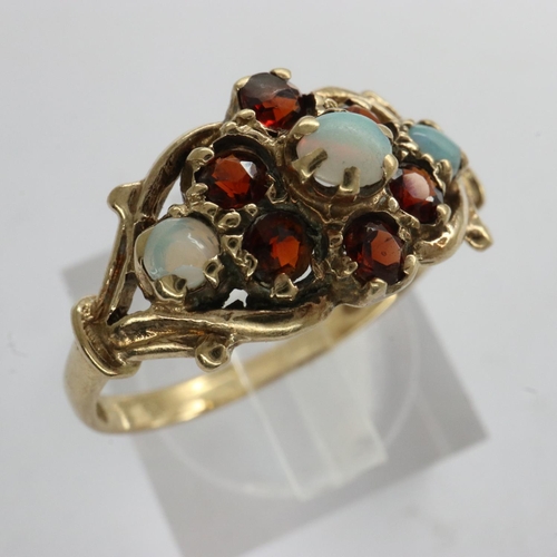 55 - Vintage 9ct gold, natural Opal and garnet set cluster ring with a Victorian design, size N/M, 2.1g. ... 