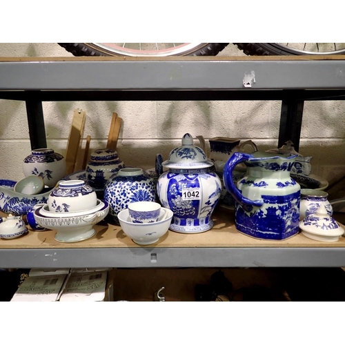 1042 - Quantity of mixed blue and white ceramics including Oriental.  Not available for in-house P&P