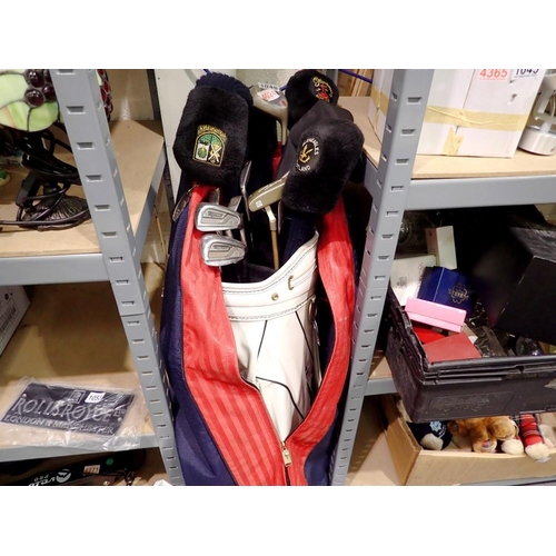 1048 - Daiwa and other golf clubs in a Bullet USA golf bag. Not available for in-house P&P