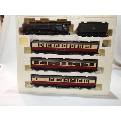 2035 - OO scale Hornby R2435 The Northumbrian train pack, A4 class locomotive with three Blood/Custard coac... 