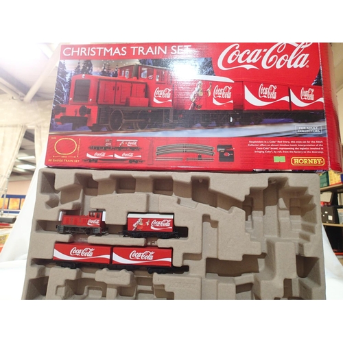 2097 - OO scale Hornby Coca-Cola Christmas train set box containing 0.4.0 diesel, and two wagons only, in e... 