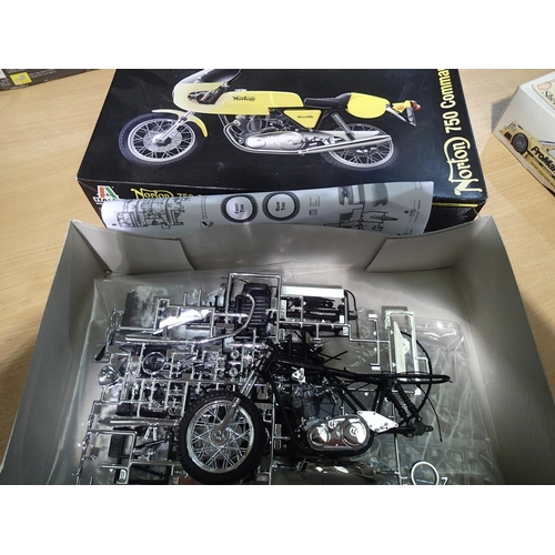 2294 - Selection of eight part built plastic car and motorcycle kits, various scales and types, contents un... 