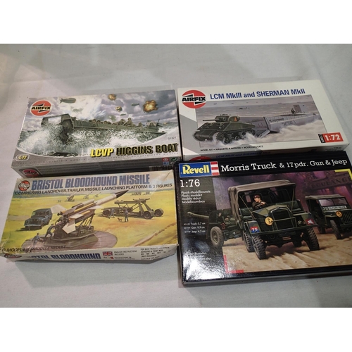 2424 - four 1/72 and 1/76 scale military kits including Airfix: Higgins Boat, LCM & Sherman, Bristol Bloodh... 