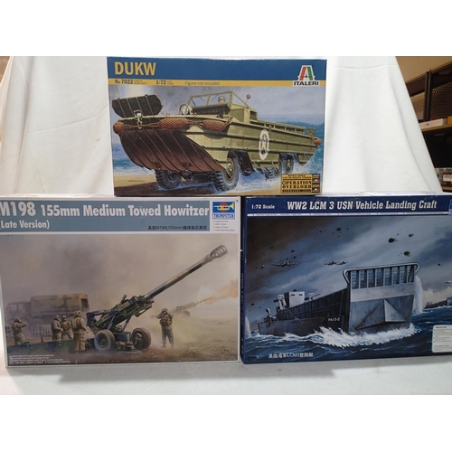 2426 - Three 1/72 scale military kits; Trumpeter L.C.M vehicle landing craft 155 medium Howitzer and Italer... 