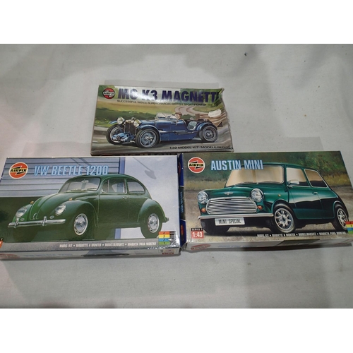 2427 - Three 1/32 scale Airfix car kits; V.W Beetle 1200, Austin Mini, MG Magnette, appear complete, unchec... 