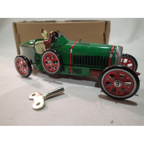 2438 - Tinplate clockwork vintage racing car, H: 18 cm, with key, working at lotting. UK P&P Group 1 (£16+V... 