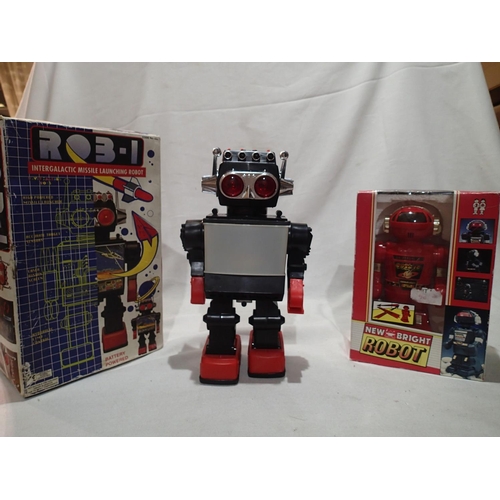 2439 - Rob-1 battery operated robot, H: 30 cm, with flashing eyes, light up screen, walking and moving arms... 