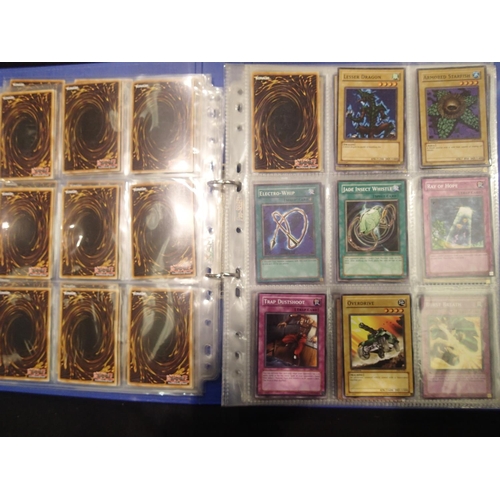 2202 - Three folders of Yu-Gi-Oh! trading cards, around 200 + cards. UK P&P Group 1 (£16+VAT for the first ... 