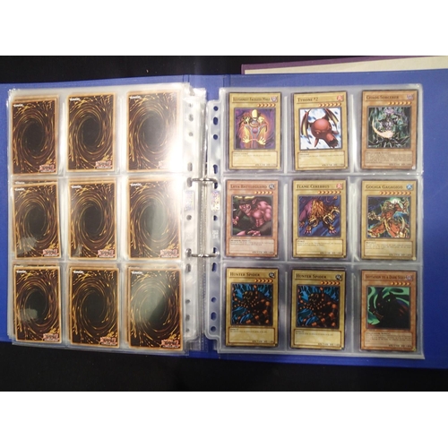 2202 - Three folders of Yu-Gi-Oh! trading cards, around 200 + cards. UK P&P Group 1 (£16+VAT for the first ... 